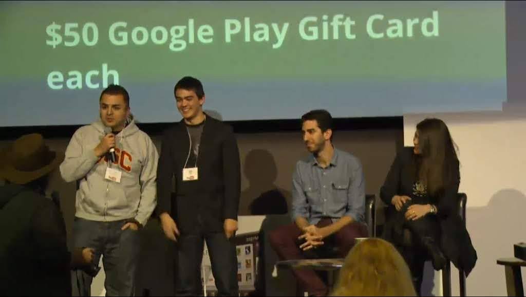 Founders at a hackathon building then presenting